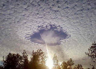 Skypunch (hole in clouds)
